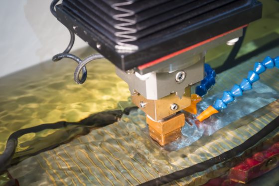 operator use  EDM electrod to make precision mold and die Spark Erosion UK